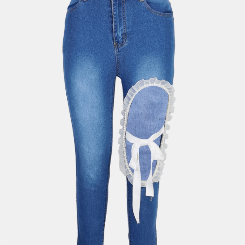 JUST RELEASED Full Size Cutout Ruffle Mesh Trim Tied Skinny Jeans